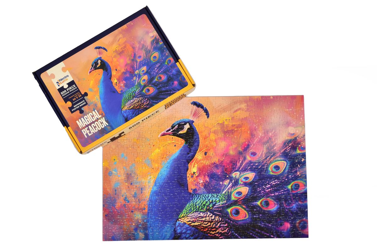 The Magical Peacock box beside the completed 500-piece puzzle